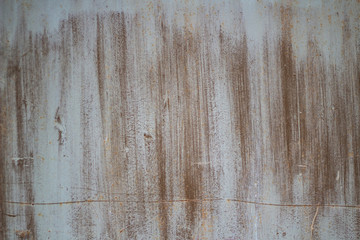 Rusty poorly painted surface.