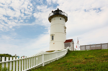 Nobska lighthouse at Cape Cod on a cloudy day. Nobska Light,  is a lighthouse located at Massachusetts on the southwestern tip of Cape Cod, 