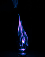 purple flame in the dark
