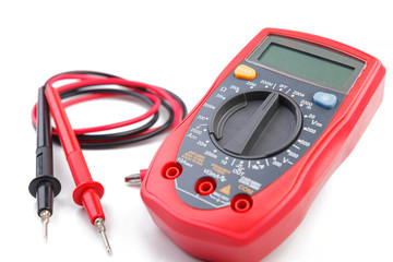 Electronic digital multimeter isolated on white background