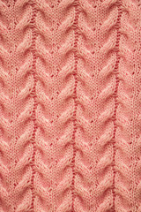 The texture of a knitted sweater. Knitting, home accessories.