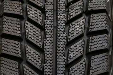 Texture  winter tires for car closeup.
