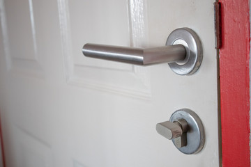 Door handle on white door
