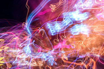 Long-exposure photo of moving colorful lights