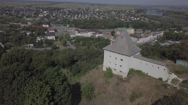 Aerial view of ruined medieval Halych Castle on the hill at sunny day, Halych, Ivano-Frankivsk region, Ukraine