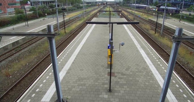 Amsterdam train station view of trains and station in metro moving in the day time and empty station Sloterdijk Netherlands Timelaps