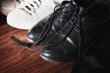 black and white shoes on the floor 