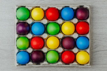 Easter festive multicolor eggs carton