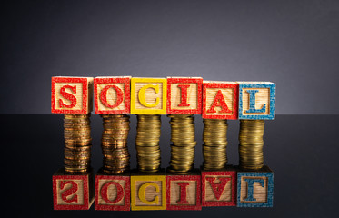 Social distance letter in wooden cube with black background.