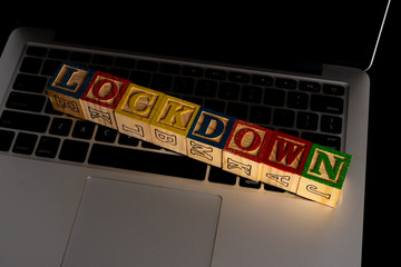 Lockdown letter in wooden cube with healty concept.