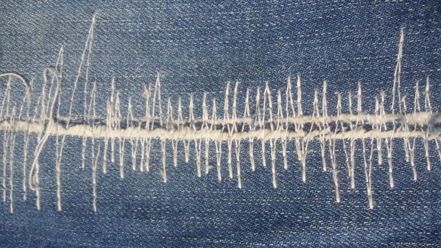 Crisscross Stitch Patch On Jeans Fabric