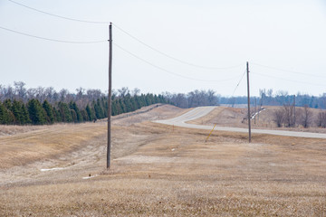 power lines in the field and road