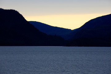 Alaska / USA - August 15, 2019: Alaska coastline view from a cruise ship deck, Alaska, USA