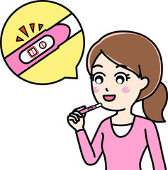 妊娠検査で陽性と出て喜ぶ女性