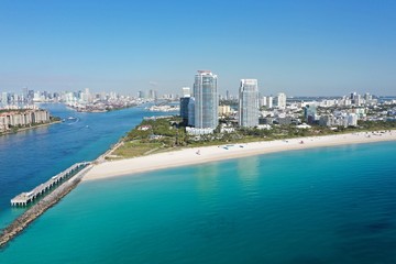 Aerial view of South Beach in Miami Beach, Florida devoid of people under coronavirus pandemic beach and park closure.