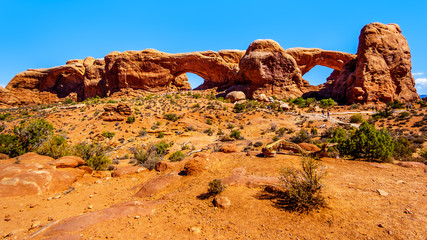North Window Arch and South Window Arch are two of the many large Sandstone Arches in the Desert Landscape of Arches National Park near Moab, Utah, United States
