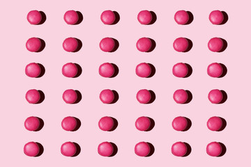 pink macaroons tree types pattern on pink background 