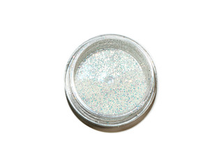 white sequins in a round jar with a hard shadow on a white background