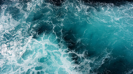 Abstraction of sea foam in the ocean. Dark water, storm waves