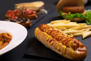 hot dog with mustard and ketchup