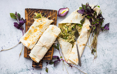 Vegan wraps with quinoa and vegetables.