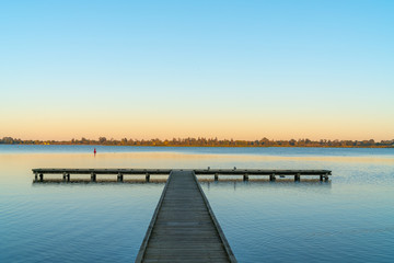 Fototapeta na wymiar T shaped jetty on edge of Lake Wendouree, Ballarat.