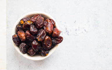 Date fruites, dates or sweet Iranian hurma. Natural organic dieting dessert food. Vegan meal. Copy space
