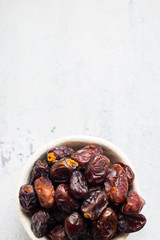 Date fruites, dates or sweet Iranian hurma. Natural organic dieting dessert food. Vegan meal. Copy space