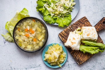 Cabbage vegetable food. Lunch with soup, stew, wrap bread rolls and fresh detox dieting salad. Vegan meal.