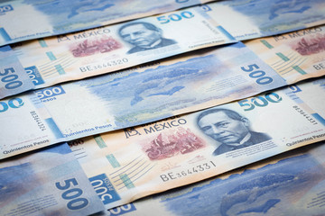 Mexican 500 pesos pile of blue bucks stack on top right