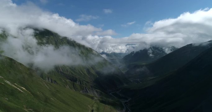 Aerial View On Kazbegi Mountains And Clouds, Caucasus Mountains In Georgia