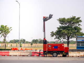 The diesel electric generator and light outdoor on road