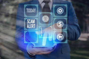 Writing note showing Scam Alert. Business concept for unsolicited email that claims the prospect of...