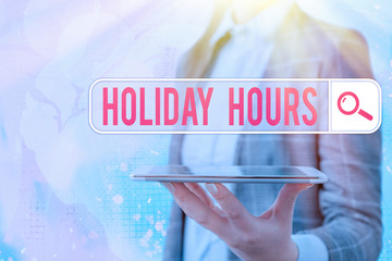 Conceptual hand writing showing Holiday Hours. Concept meaning employee receives twice their normal...