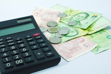 Money planning,Thai bank notes and calculators,finance