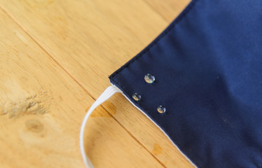 Drop of water on cloth mask for protect from covid-19 / cloth mask 