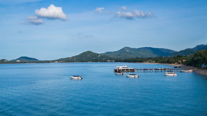 Fototapeta na wymiar Sailboats moored at Pralan Pier, Koh Samui, Thailand