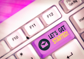 Writing note showing Let Get Started. Business concept for encouraging someone to begin doing...