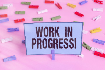 Text sign showing Work In Progress. Business photo showcasing unfinished project that still added...