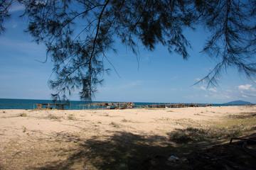 View landscape and wind with Kolek or Koleh traditional fishing boat of lower southern provinces of thai at Banton Beach and village in Narathiwat, Thailand