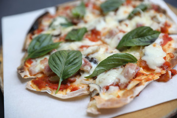 Pizza ham mushroom and basil
