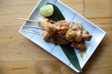 japanese food , Chicken yakitori on wood background