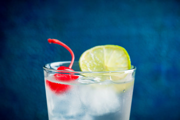 Rum collins cocktail (variation of traditional Tom collins). Selective focus. Shallow depth of field.