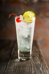 Rum collins cocktail (variation of traditional Tom collins). Selective focus. Shallow depth of field.