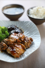 japanese food , Chicken teriyoki with rice on wood background