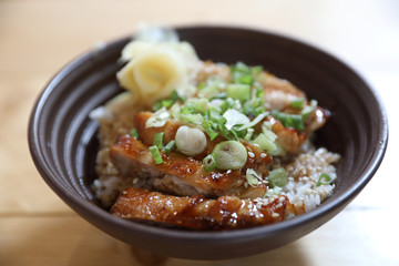 japanese food , Chicken teriyoki with rice on wood background