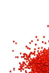 Minimalistic background for valentine's day with wavy little hearts on a white background. top view.