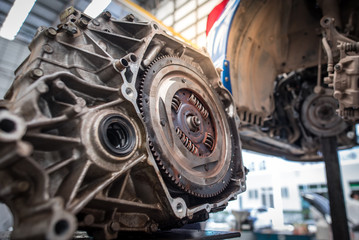 View of engine parts, engine parts and flywheel or flywheel cars Hand auto mechanic work Car repair...