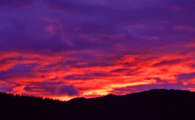 Amazing colourful sunset sky in the north of the Island of Skye in the Highlands of Scotland