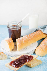 Homemade French baguette with jam for Breakfast, simple home-made food